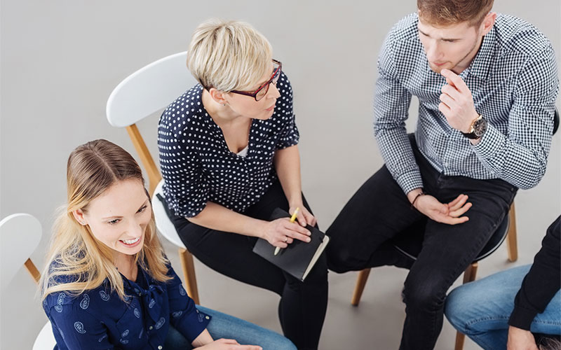 Gruppe im Coaching zur Teilhabe am Arbeitsmarkt